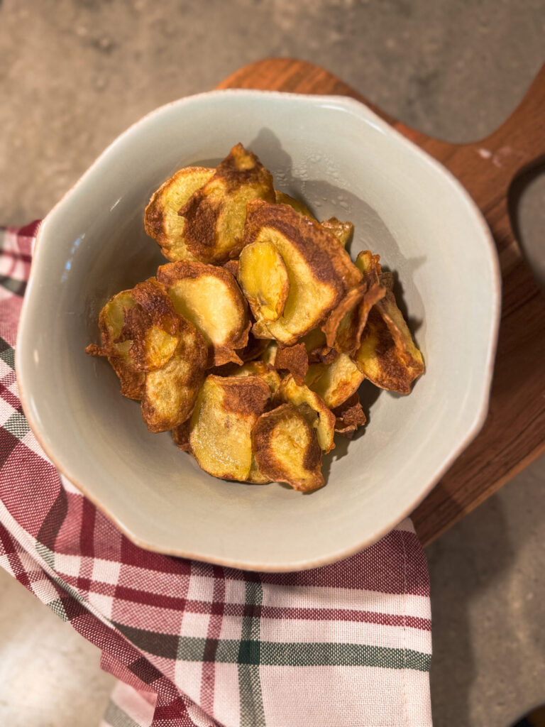 a bowl of fried potatoes
